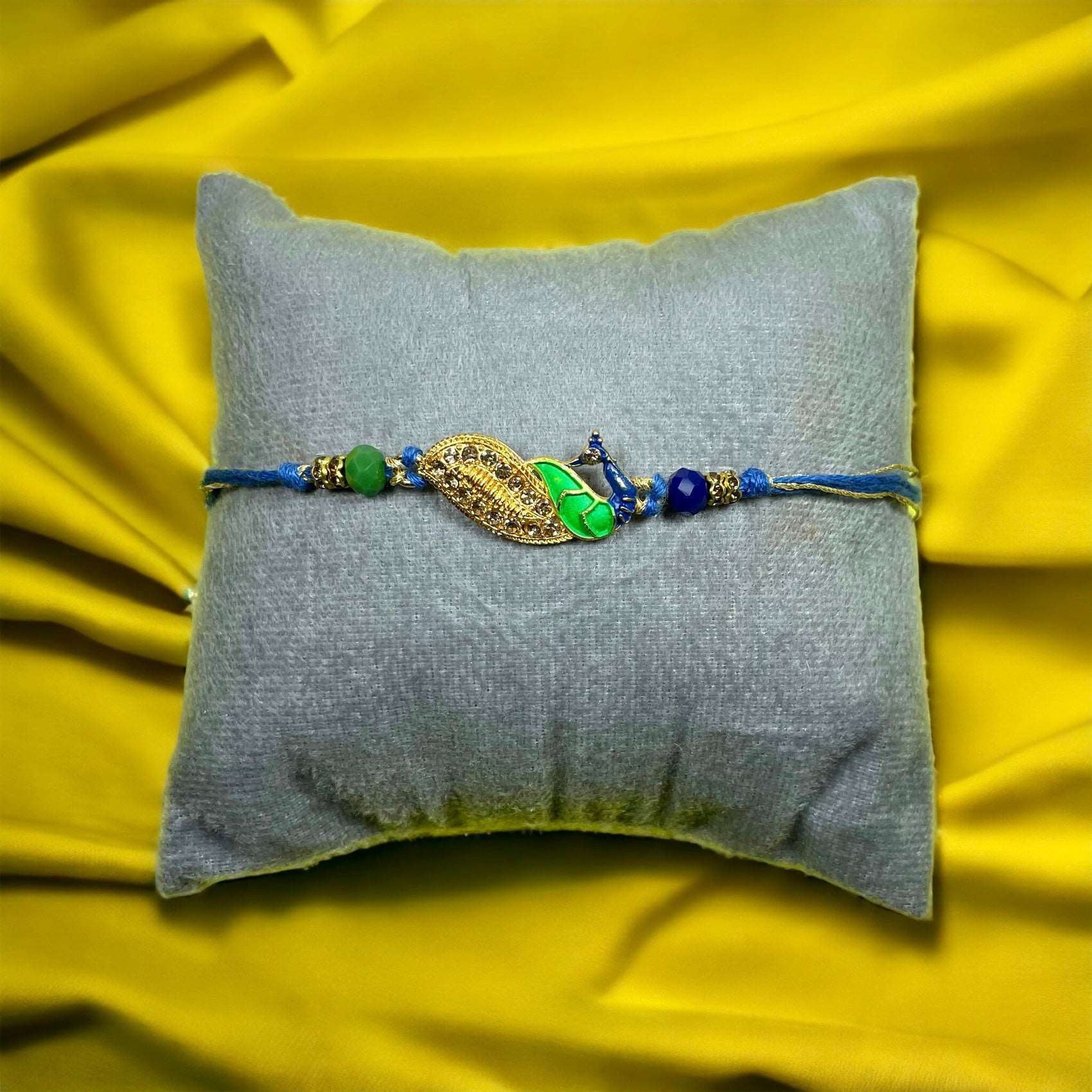 Beautiful Peacock Rakhi With Peacock Rakhi With Roli Chawal - Premium Rakhi from TheGiftBays - Just ₹175! Shop now at TheGiftBays