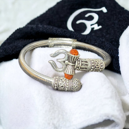 Om shape bracelet with rudraksh in silver color - Premium Rakhi from TheGiftBays - Just ₹199! Shop now at TheGiftBays